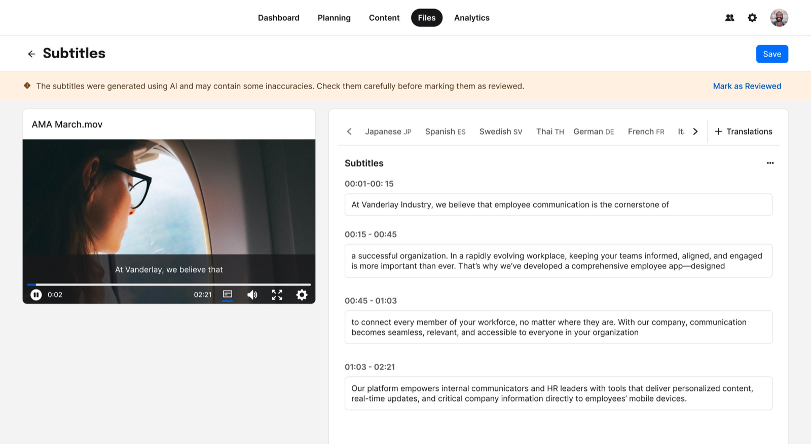 The desktop subtitle editor: a video preview beside AI-generated transcript blocks with timestamps, language tabs, and a banner warning that AI subtitles should be reviewed before publishing.